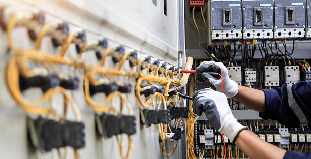 Professional Electrician technician working in Harper, KS